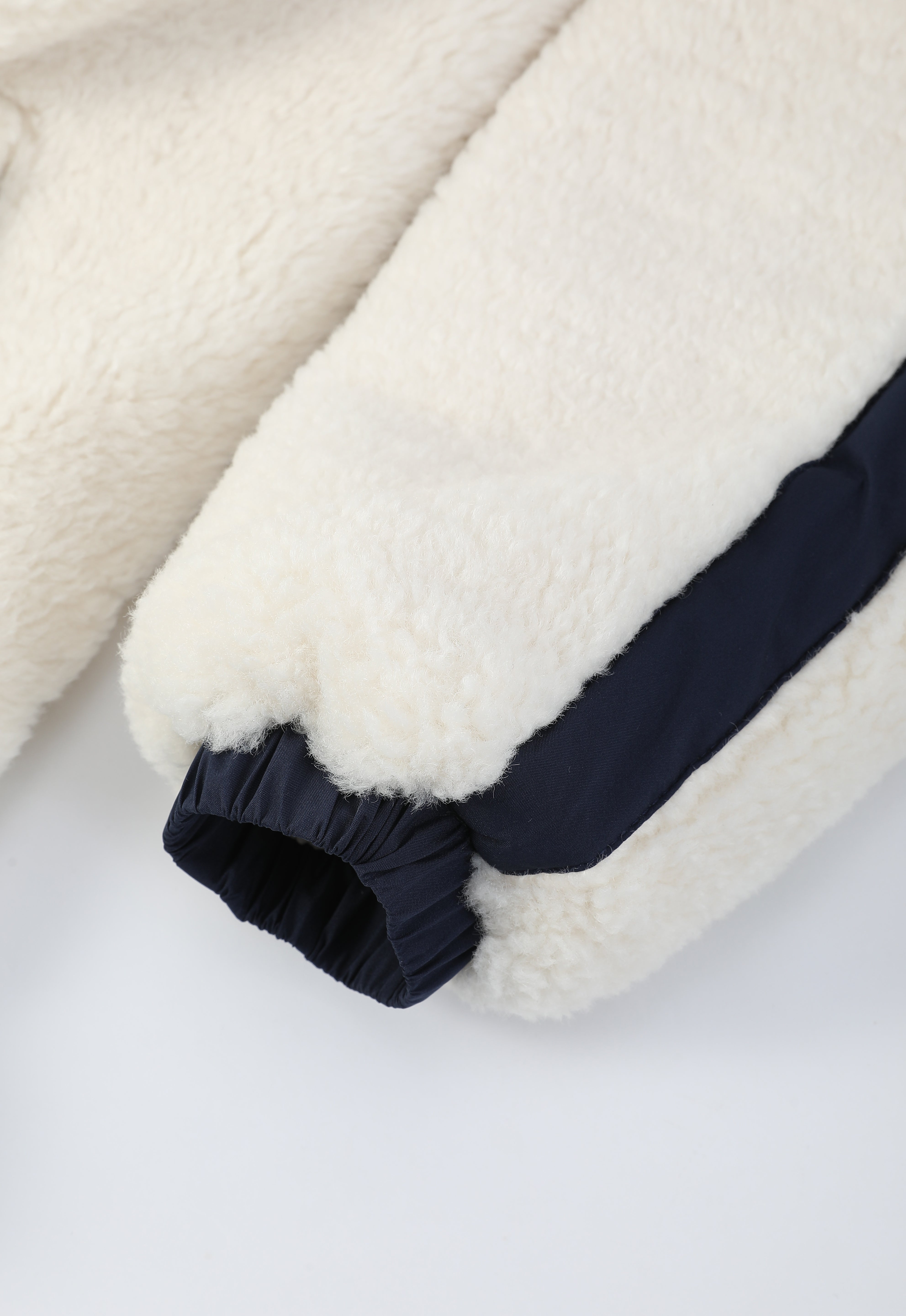 Doudoune polaire écrue et bleu foncé homme à capuche DUFFY