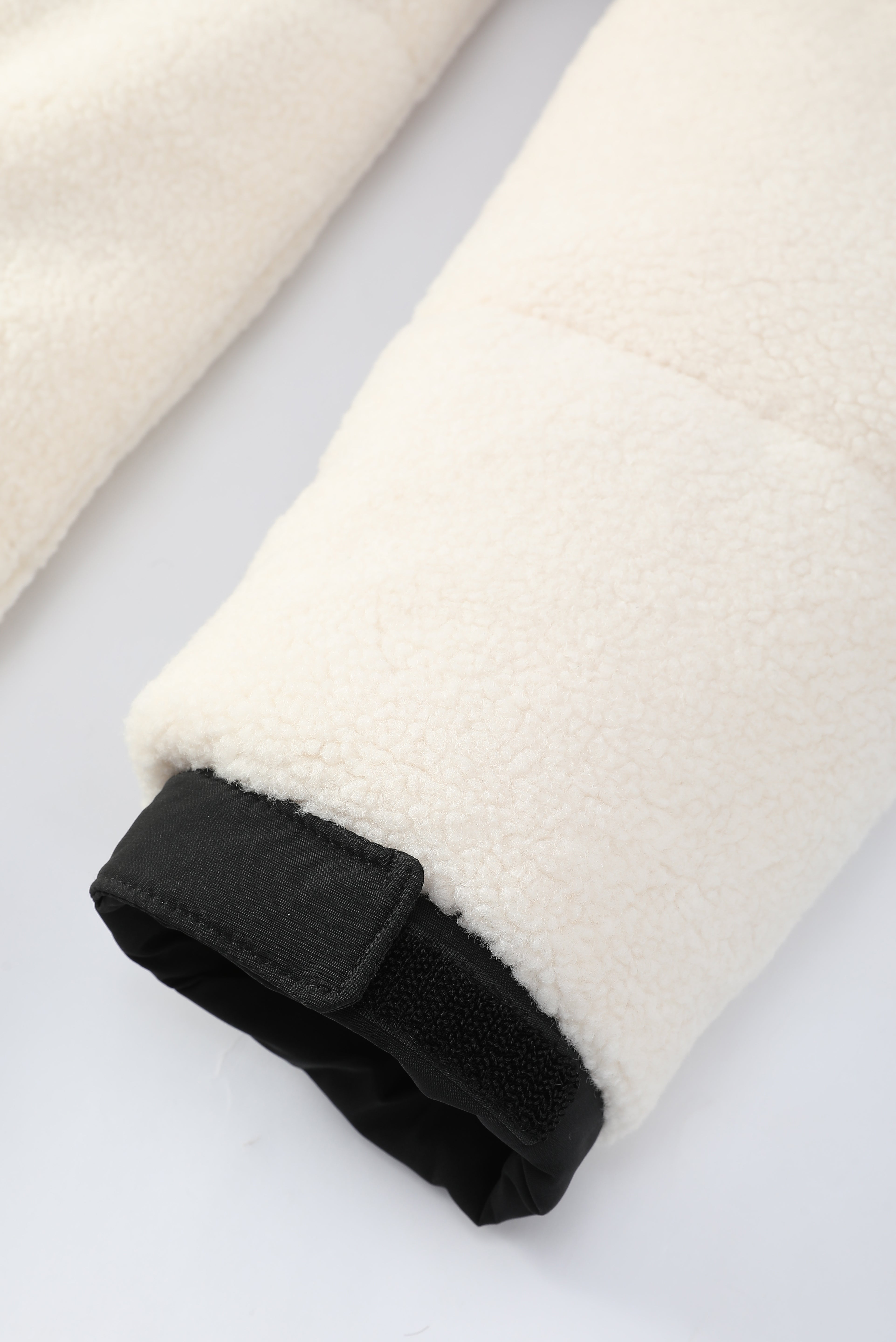 Doudoune matelassée effet sherpa écrue et noire HERMAN