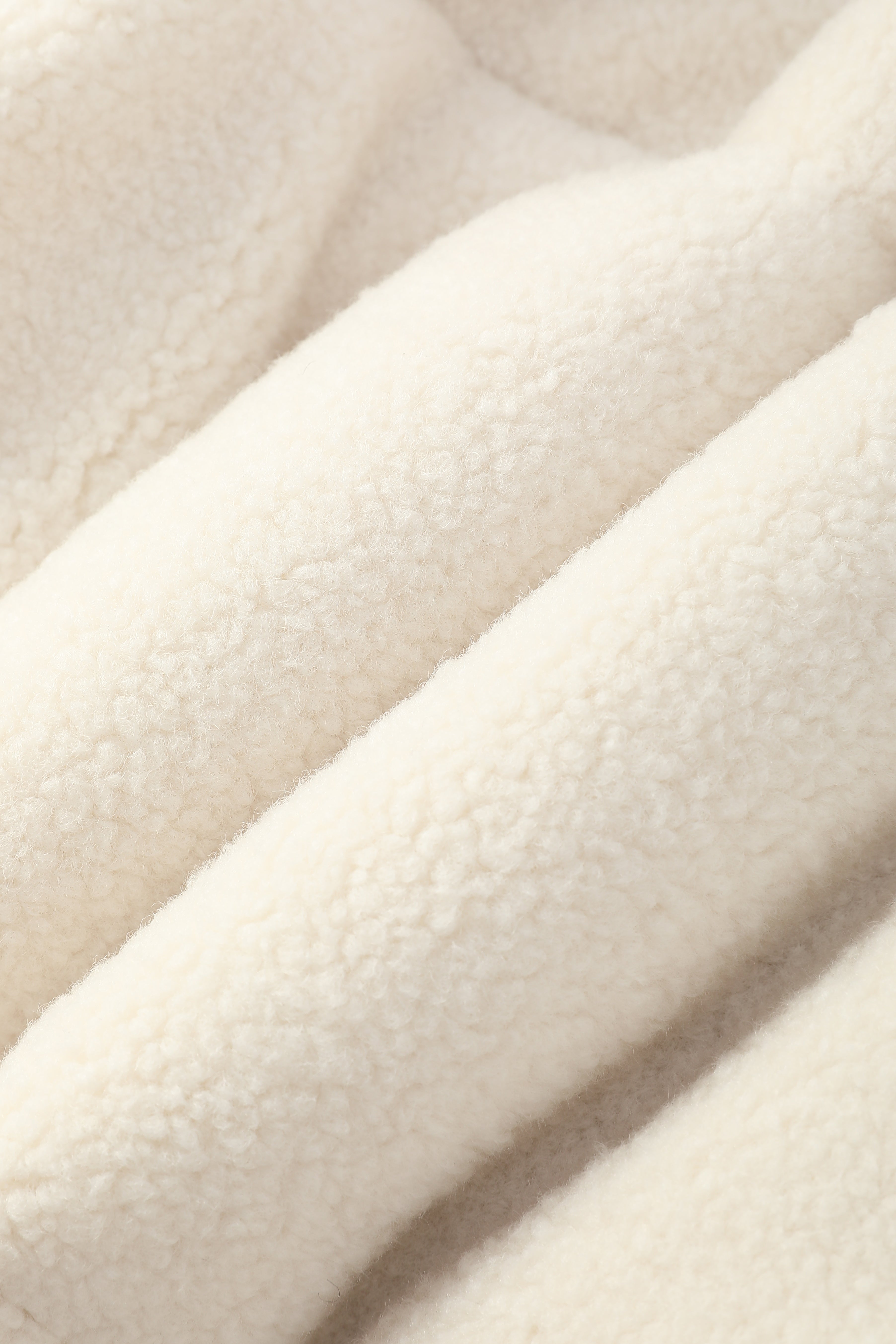 Doudoune matelassée effet sherpa écrue et noire HERMAN