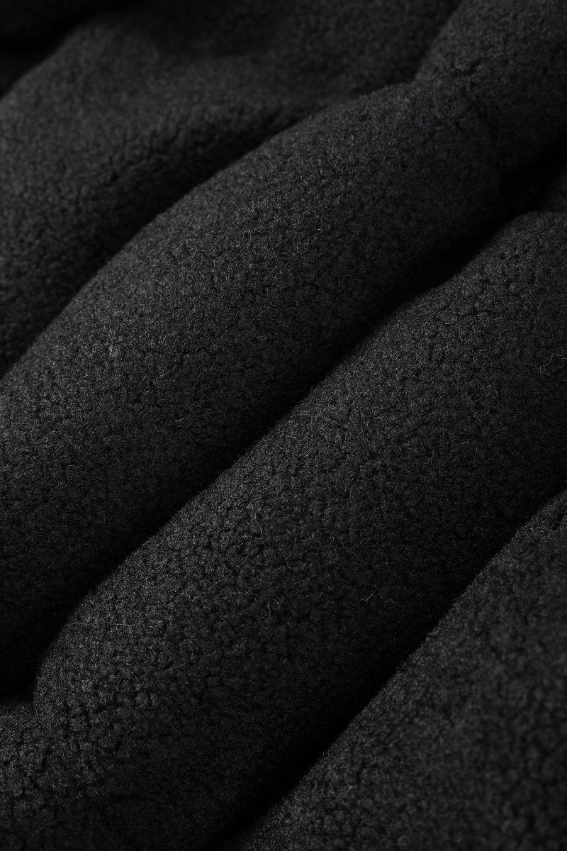 Doudoune matelassée effet sherpa noire HERMAN